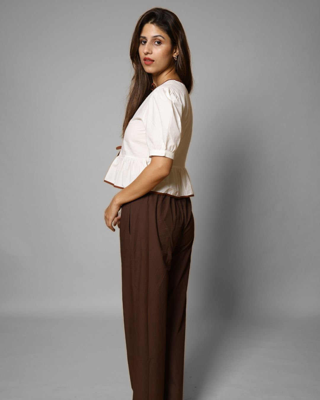 Wavy Ivory Tie-Detail Peplum Top