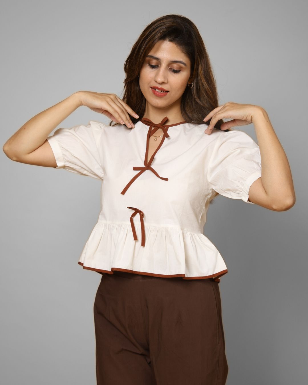 Wavy Ivory Tie-Detail Peplum Top